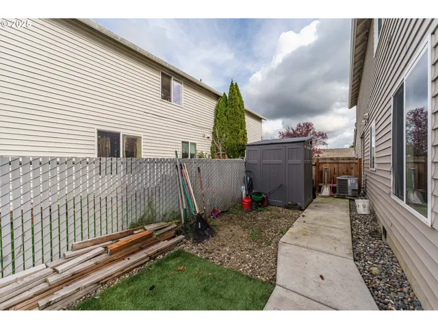 a view of backyard of a house