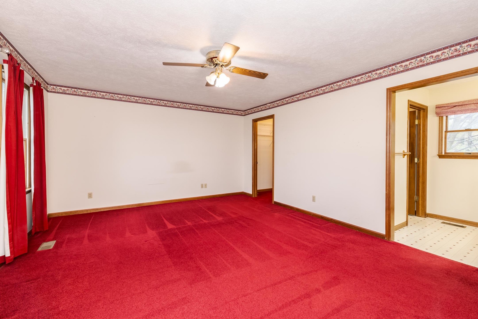1402 East Indiana Avenue Pontiac, IL 61764 - Photo 24 of 54 a view of room with window and ceiling fan