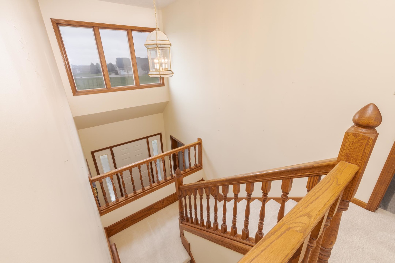 1402 East Indiana Avenue Pontiac, IL 61764 - Photo 28 of 54 a view of staircase with large window