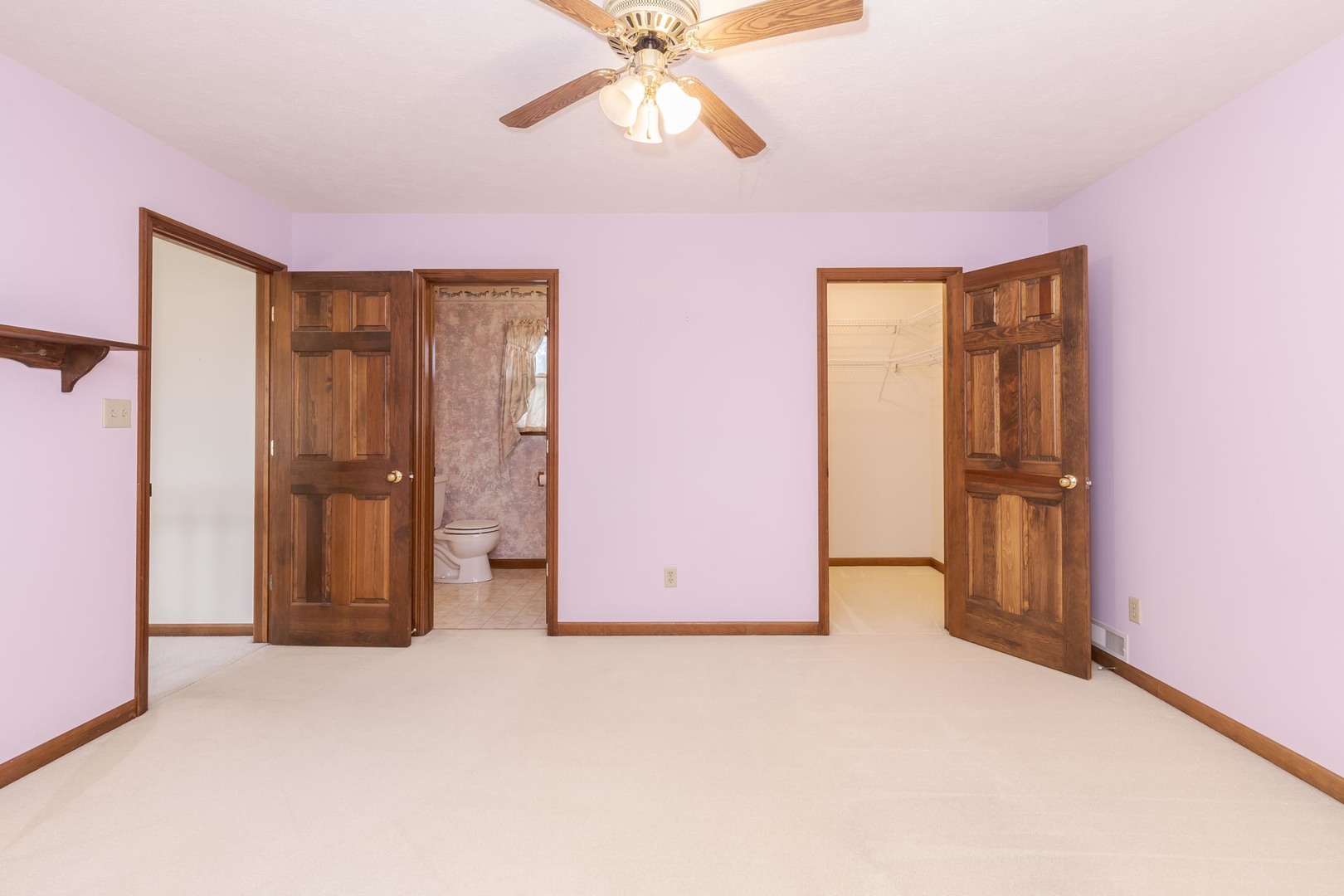 1402 East Indiana Avenue Pontiac, IL 61764 - Photo 30 of 54 an empty room with closet and windows