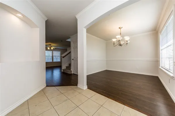 a view of livingroom with furniture and chandelier