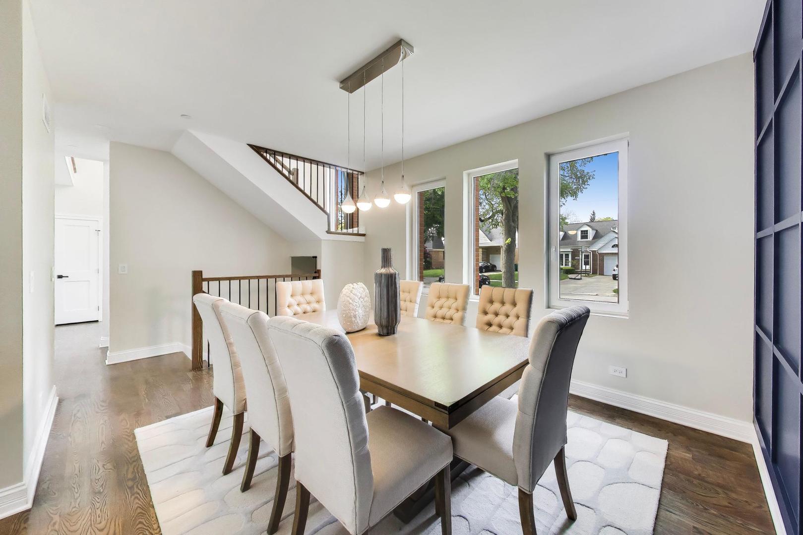 1133 Fortuna Avenue Park Ridge, IL 60068 - Photo 12 of 46 a view of a dining room with furniture and wooden floor
