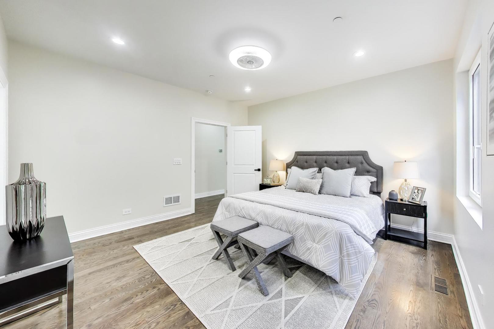 1133 Fortuna Avenue Park Ridge, IL 60068 - Photo 20 of 46 a bedroom with a bed and wooden floor
