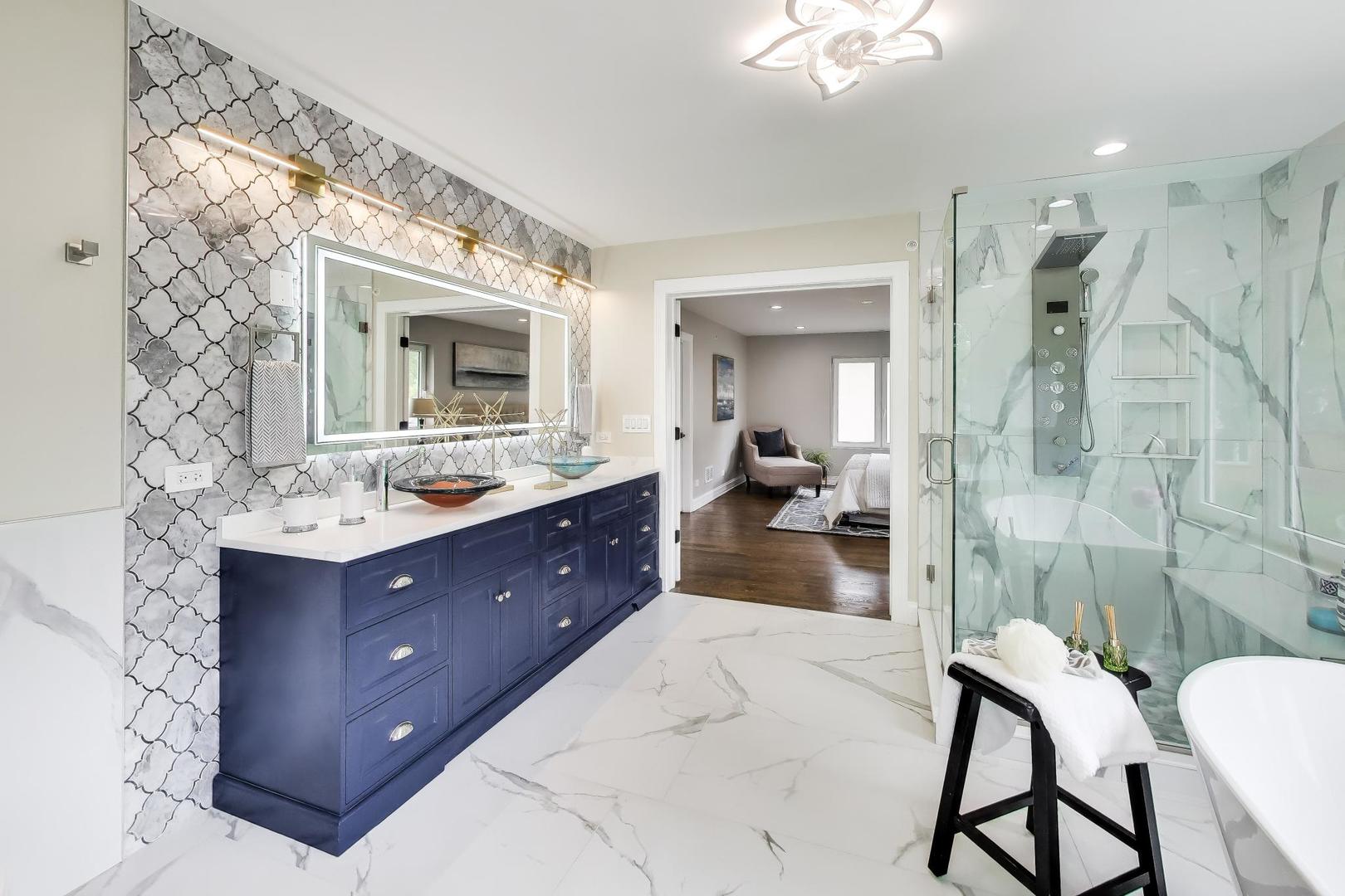 1133 Fortuna Avenue Park Ridge, IL 60068 - Photo 29 of 46 a bathroom with a sink mirror and a shower