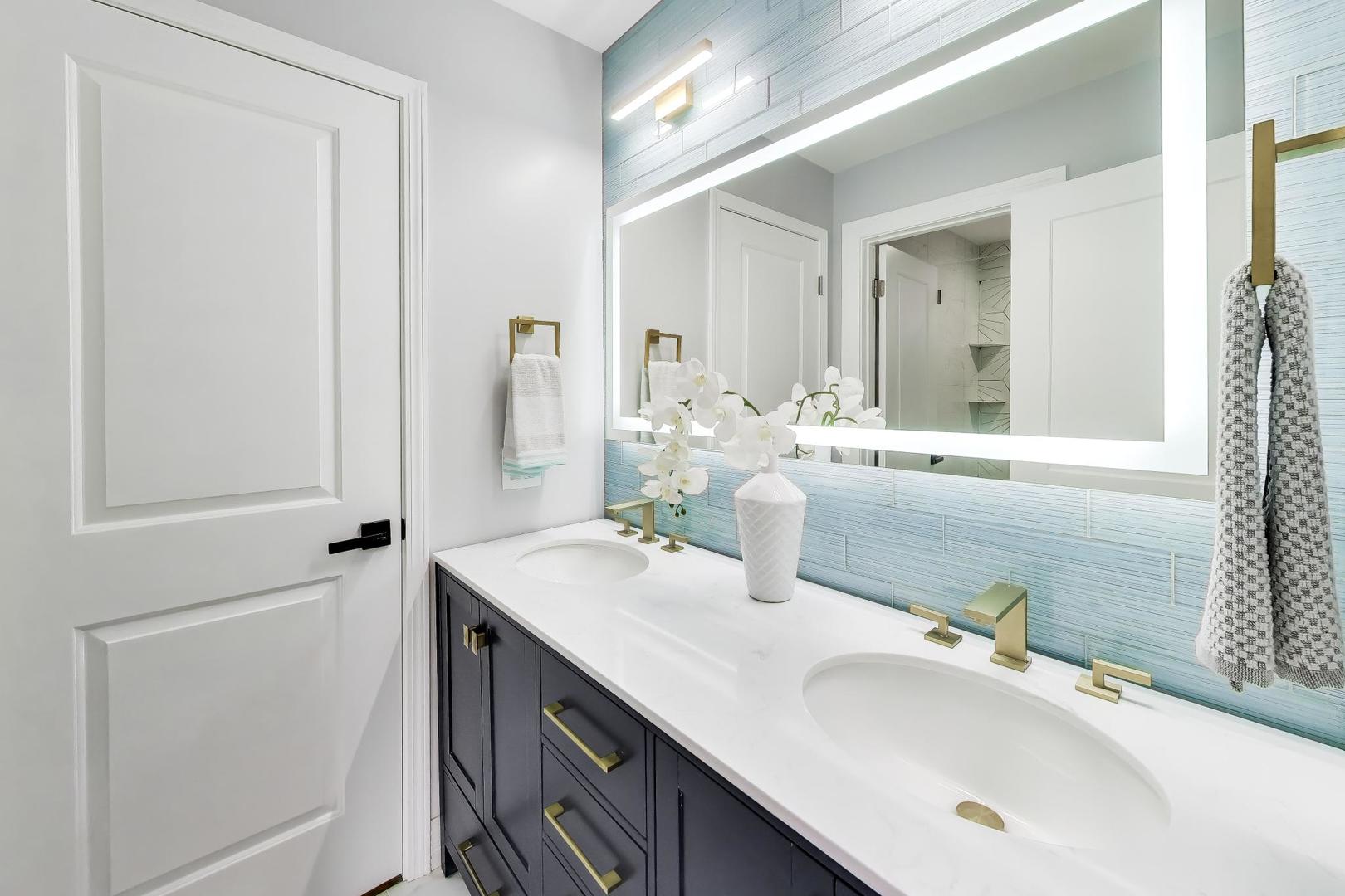 1133 Fortuna Avenue Park Ridge, IL 60068 - Photo 34 of 46 a bathroom with a sink and a mirror