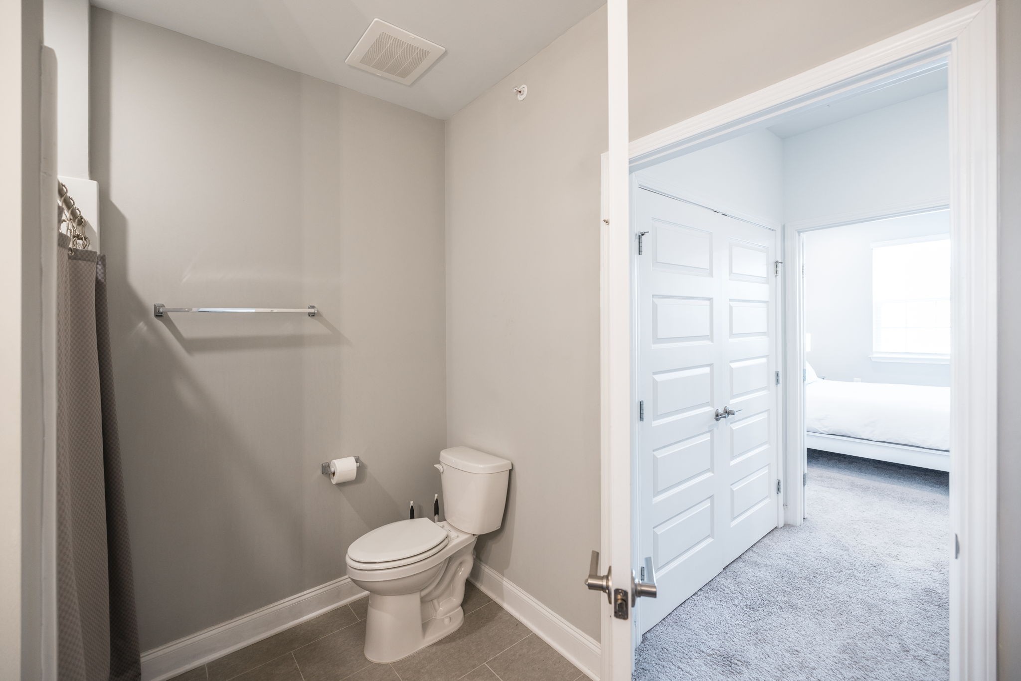 2000 Shadow Green Drive, Unit 302 Franklin, TN 37064 - Photo 9 of 19 a bathroom with a sink a toilet and shower