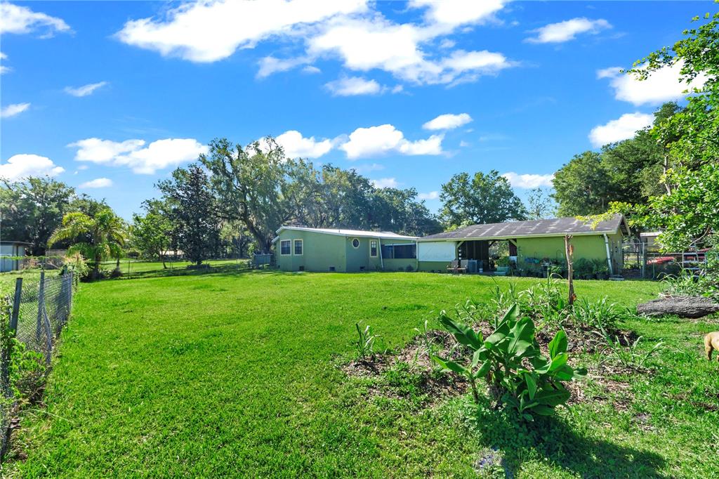 13610 Acker Road Dover, FL 33527 - Photo 24 of 53 a view of a back yard