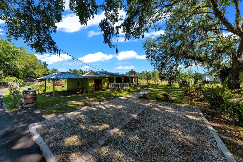 13610 Acker Road Dover, FL 33527 - Photo 32 of 53 a view of a house with a yard