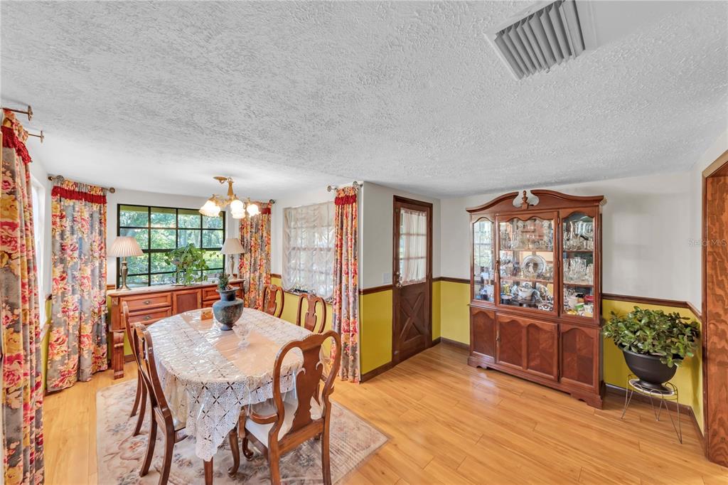 13610 Acker Road Dover, FL 33527 - Photo 42 of 53 a view of a livingroom with furniture window and outside view