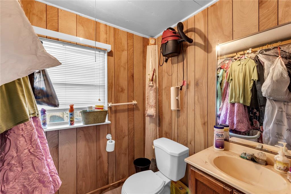 13610 Acker Road Dover, FL 33527 - Photo 53 of 53 a bathroom with a sink toilet and shower