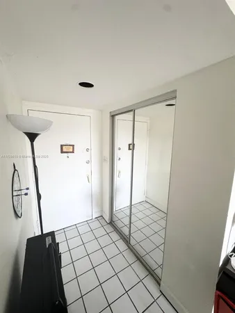 a bathroom with a toilet sink and shower