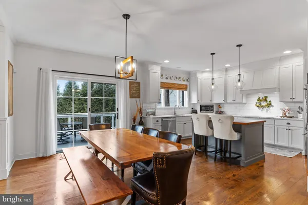 a bedroom with a bed and a flat screen television