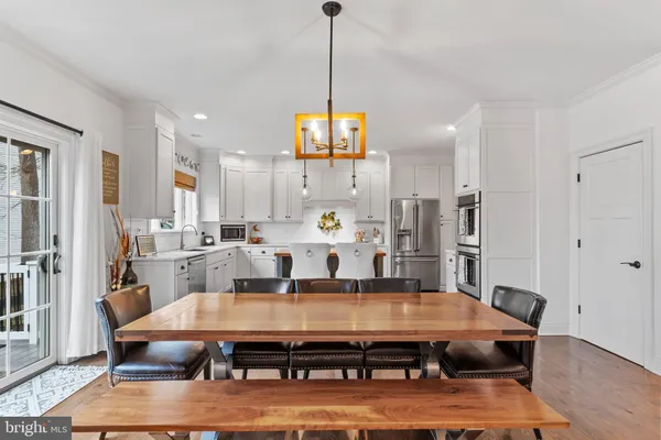 a view of a hallway with entryway door