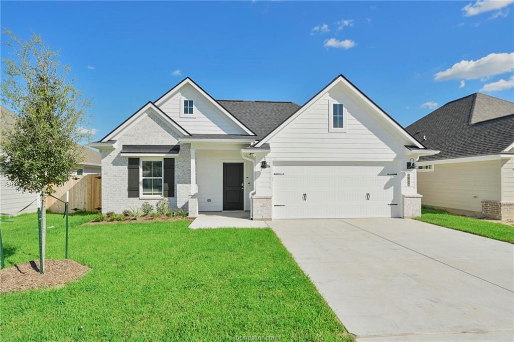 3124 Tarleton Court Bryan, TX 77808 - Photo 1 of 22 a front view of a house with a yard and porch