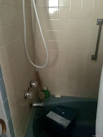 a bathroom with a toilet and a sink