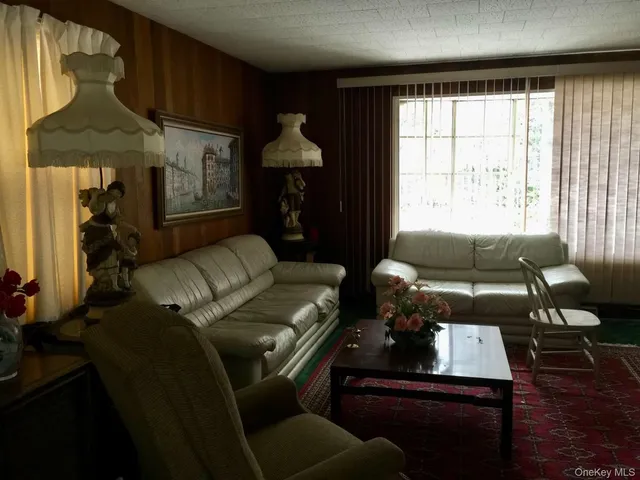 a backyard of a house with seating space