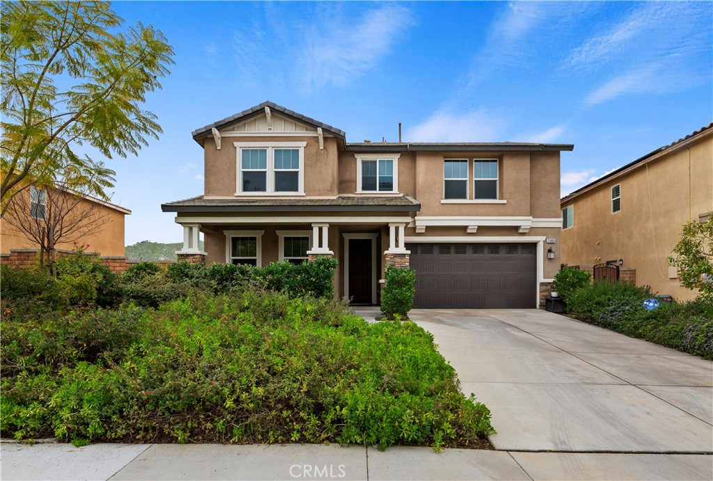 21063 Spring Street Riverside, CA 92507 - Photo 1 of 1 a front view of a house with a yard