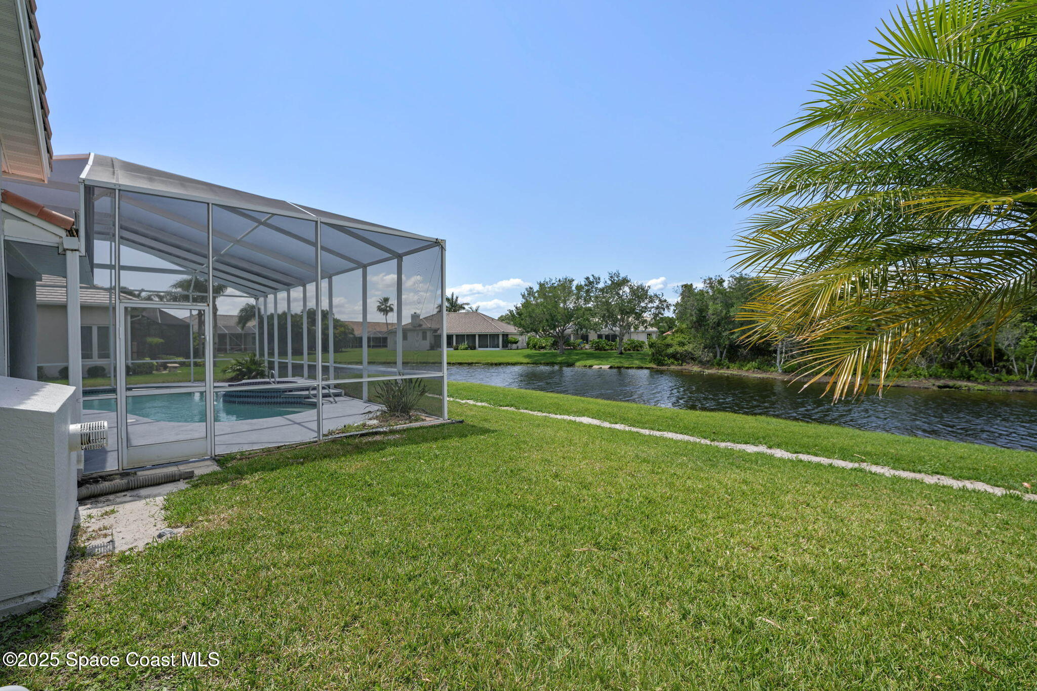 706 Palmer Way Melbourne, FL 32940 - Photo 38 of 43 a view of a backyard with swimming pool