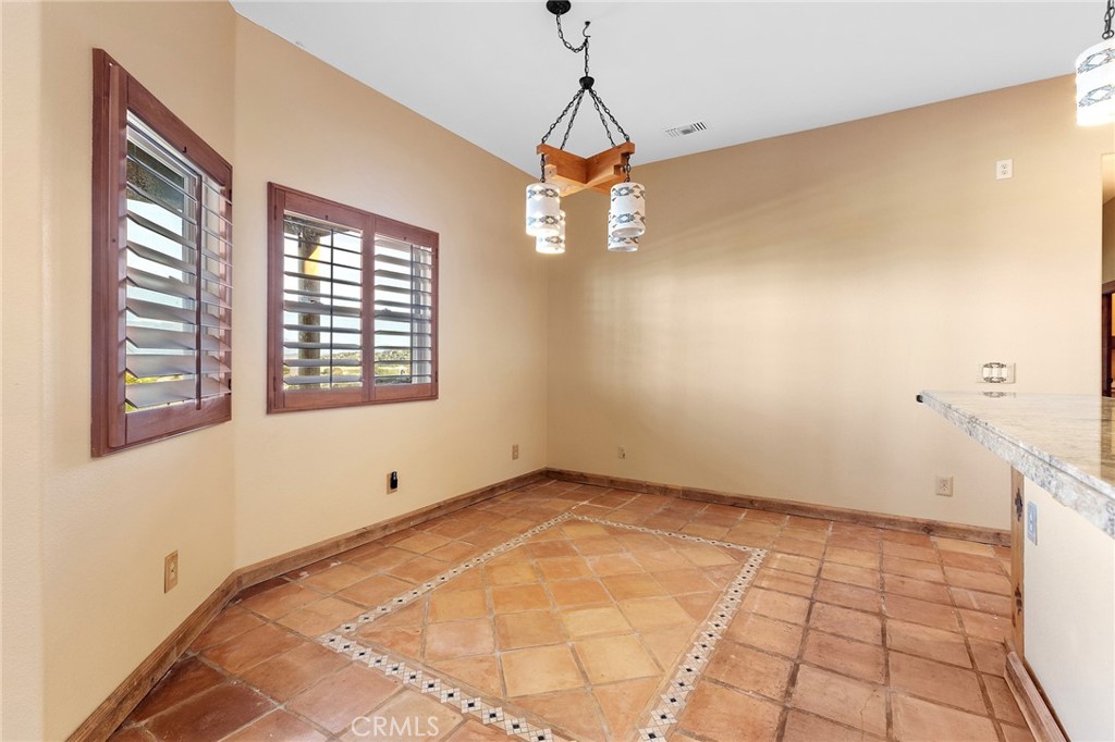23032 Sky Mesa Road Homeland, CA 92548 - Photo 24 of 58 a view of an empty room with a window