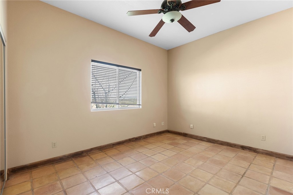 23032 Sky Mesa Road Homeland, CA 92548 - Photo 29 of 58 a view of an empty room with a window