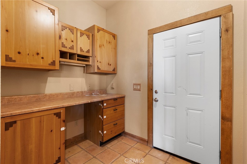 23032 Sky Mesa Road Homeland, CA 92548 - Photo 41 of 58 a kitchen with stainless steel appliances granite countertop a sink and cabinets