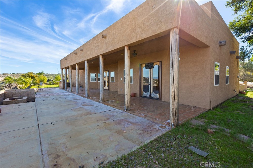 23032 Sky Mesa Road Homeland, CA 92548 - Photo 44 of 58 a view of a house with porch and furniture