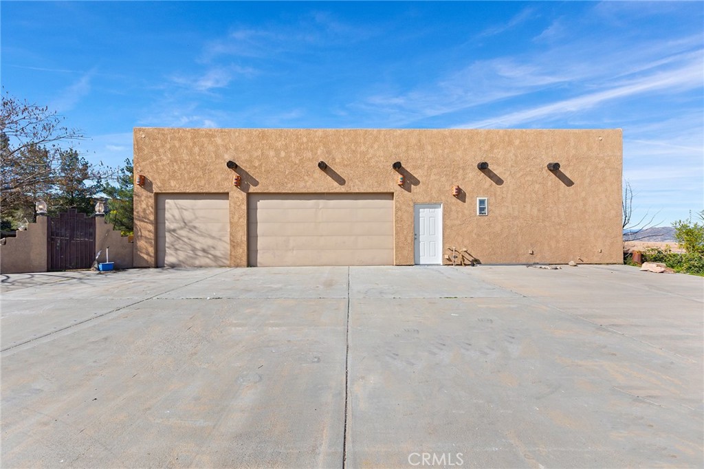 23032 Sky Mesa Road Homeland, CA 92548 - Photo 50 of 58 front view of a house with a street