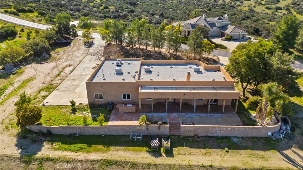 23032 Sky Mesa Road Homeland, CA 92548 - Photo 54 of 58 an aerial view of a house with a yard lake and trees