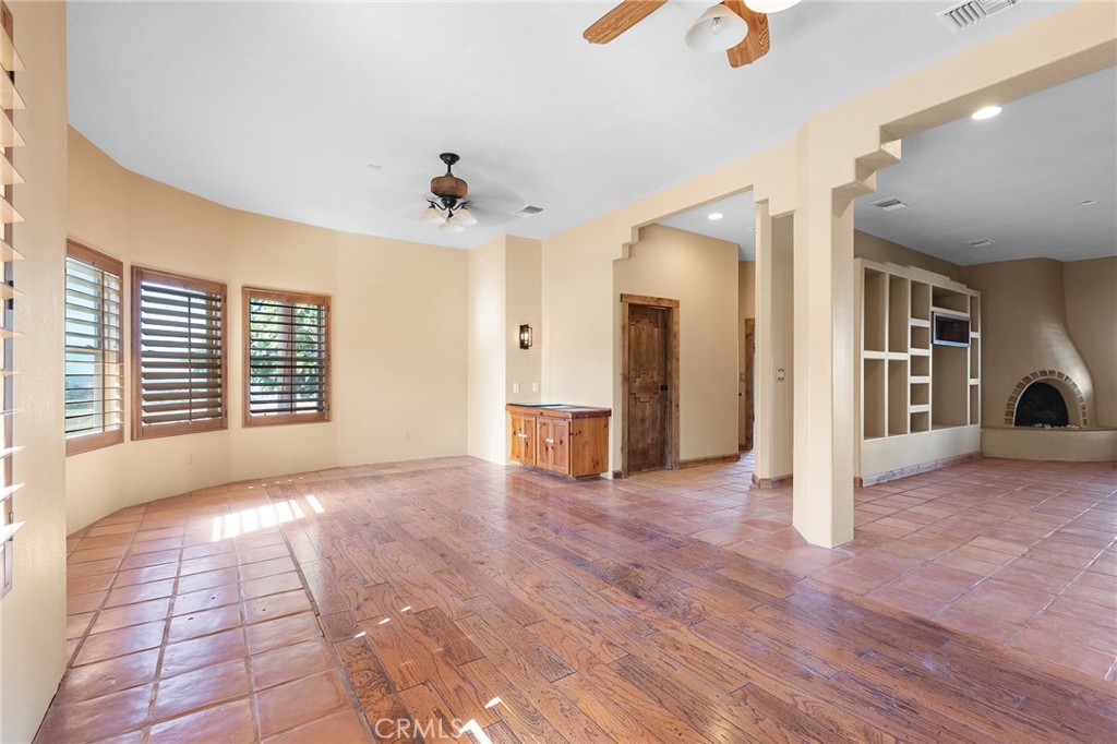 23032 Sky Mesa Road Homeland, CA 92548 - Photo 7 of 58 a view of a livingroom with a staircase