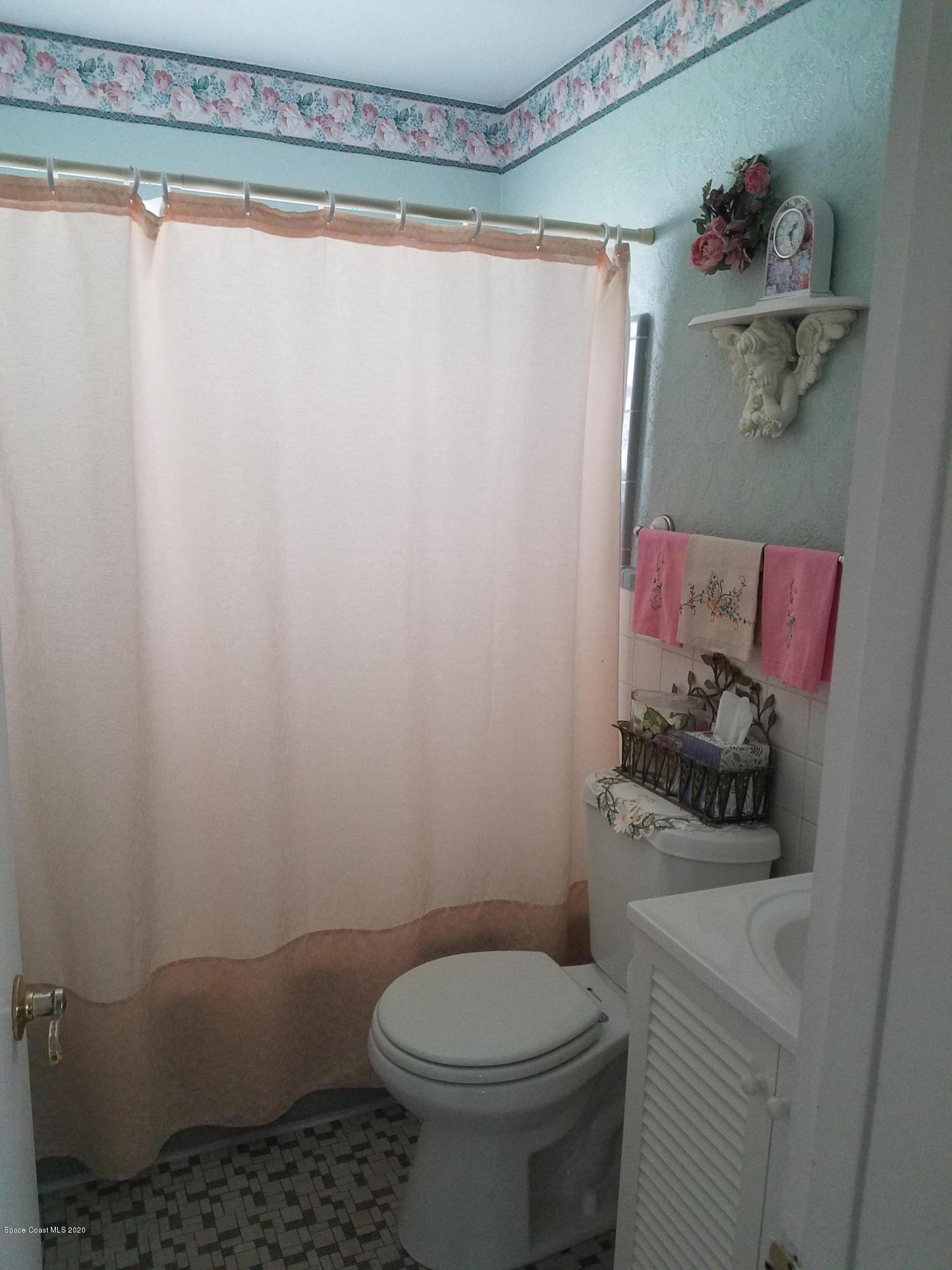 1235 Croton Road Melbourne, FL 32935 - Photo 22 of 27 hall bath