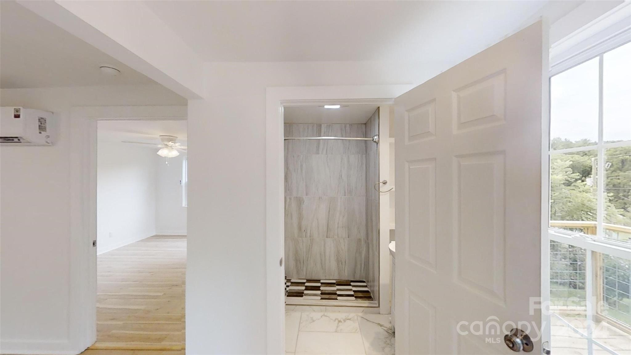 46 Lewis Street Canton, NC 28716 - Photo 20 of 27 a bathroom with a shower