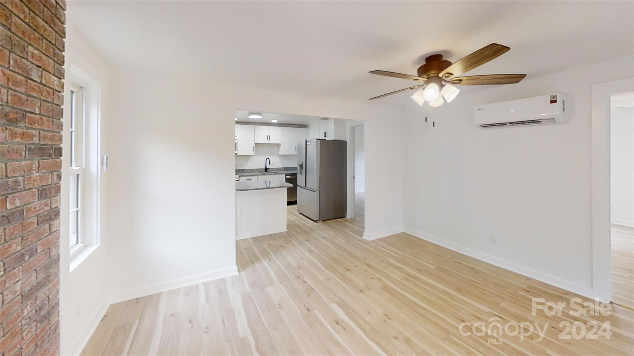 46 Lewis Street Canton, NC 28716 - Photo 8 of 27 a view of a kitchen with a sink and a kitchen view