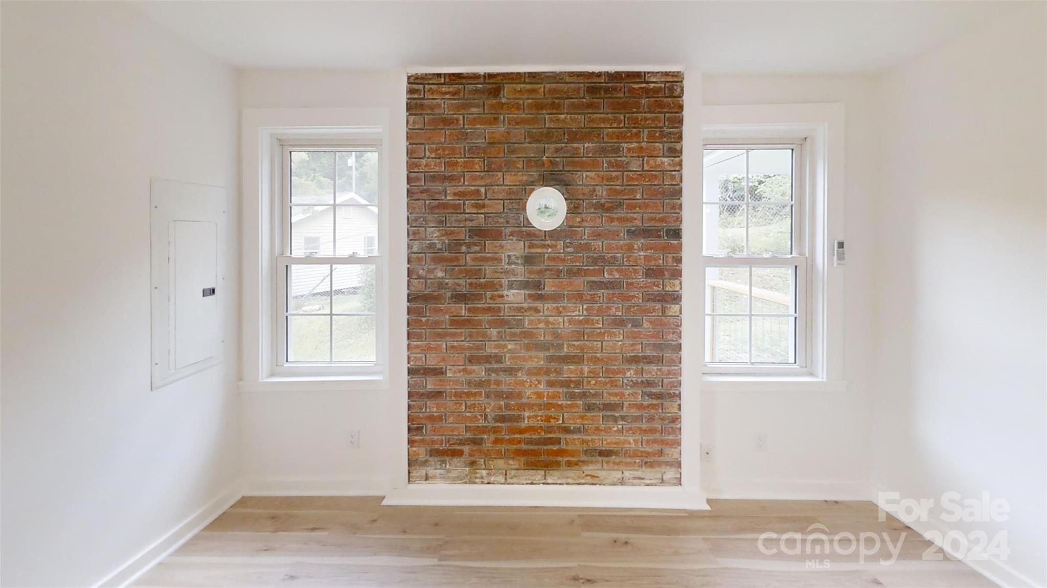 46 Lewis Street Canton, NC 28716 - Photo 9 of 27 an empty room with windows