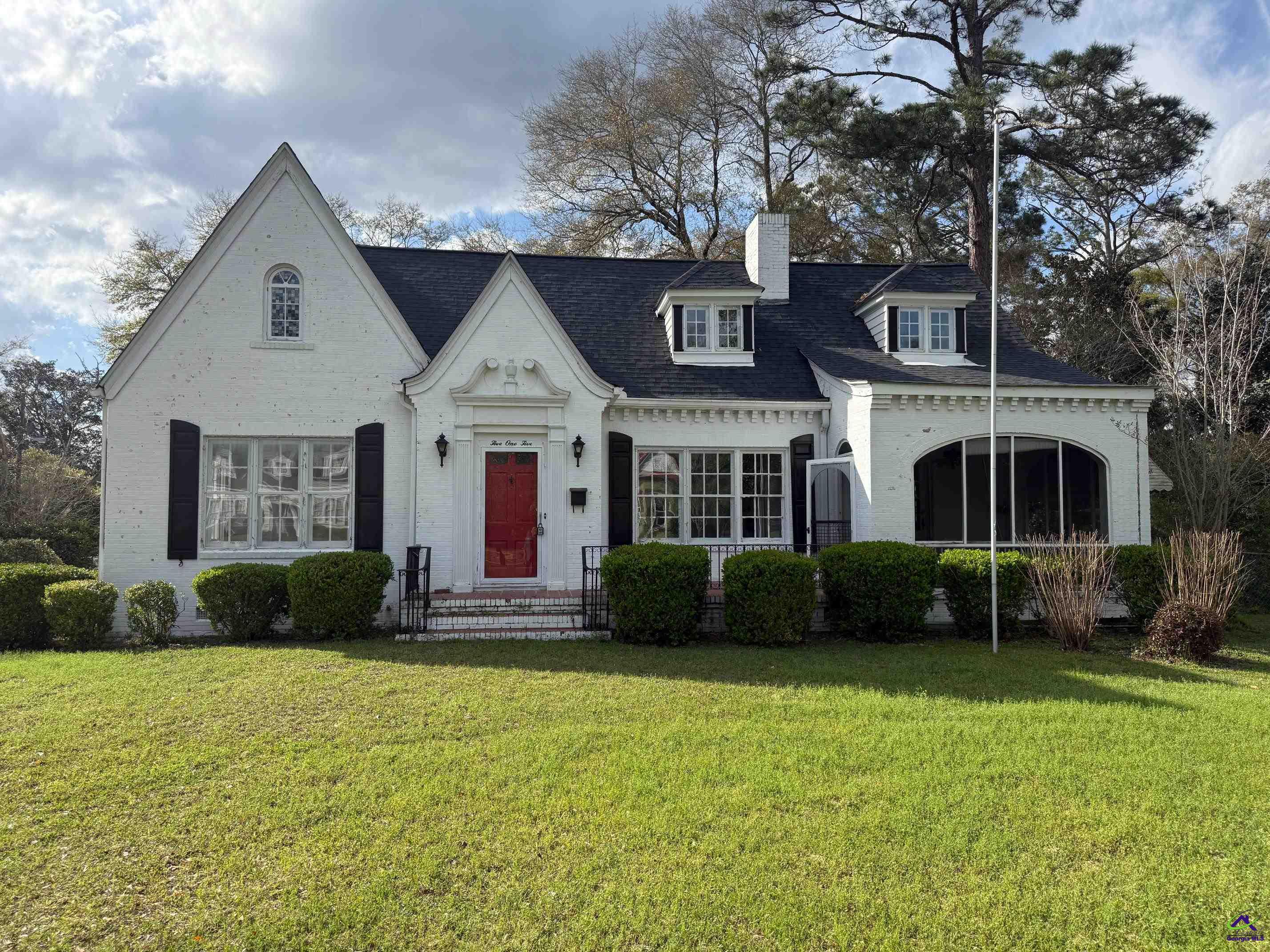 515 Engram Street Montezuma, GA 31063 - Photo 2 of 35 a front view of a house with garden