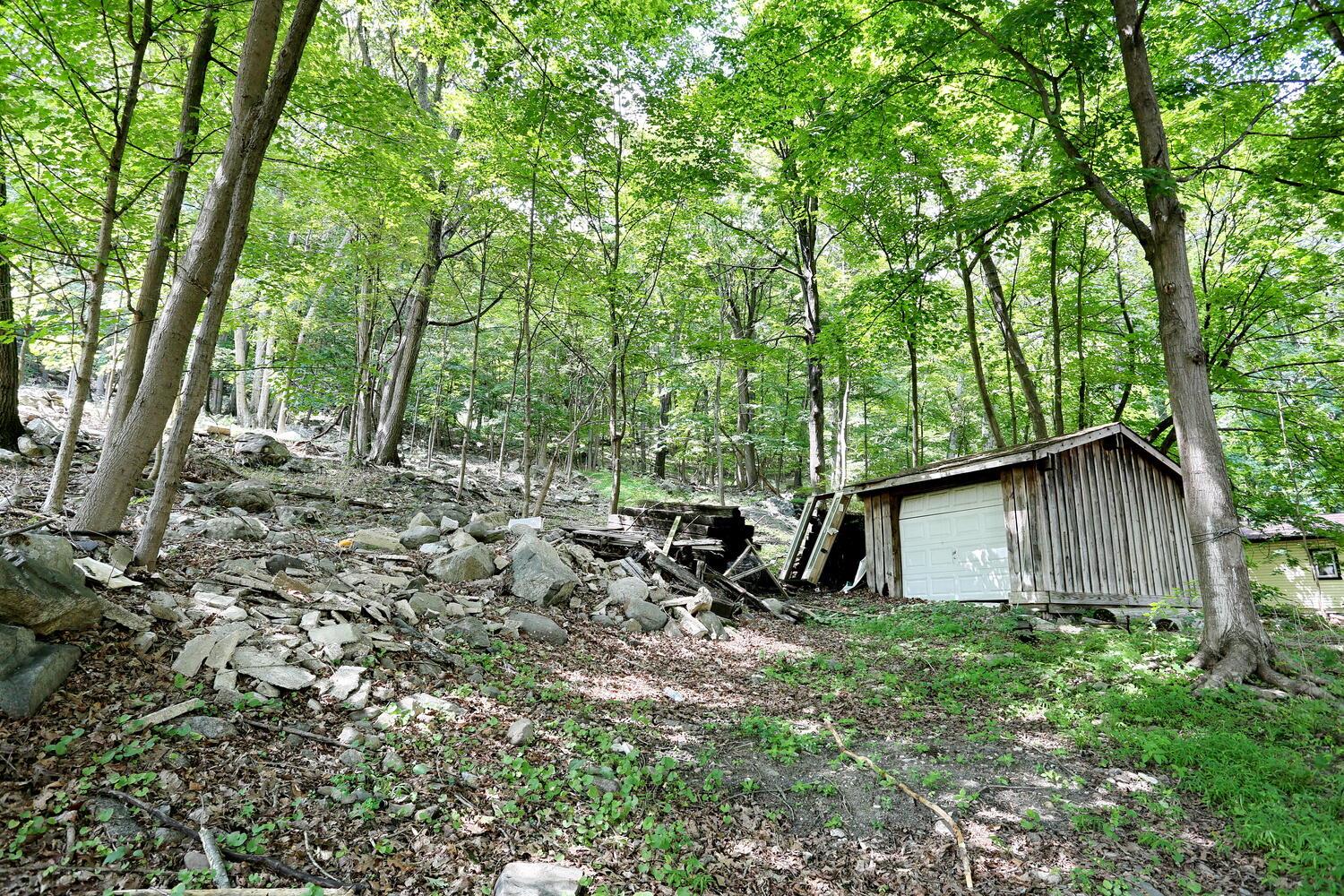 325 Call Hollow Road Haverstraw, NY 10980 - Photo 9 of 12 View of yard with an outbuilding and a garage