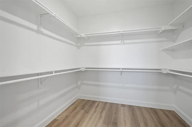 a view of an empty walk in closet