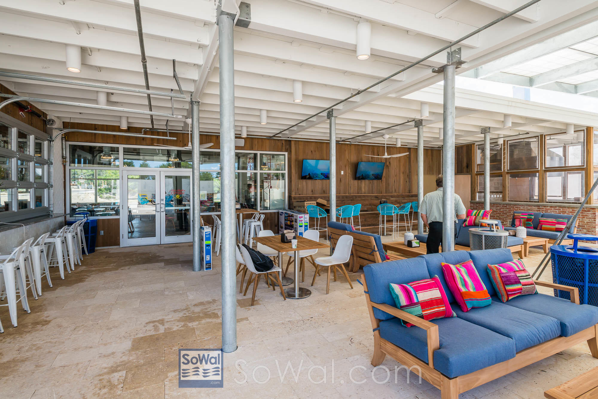 120 East Pine Lands Loop, Unit B Inlet Beach, FL 32461 - Photo 23 of 36 a living room with patio furniture and a large window