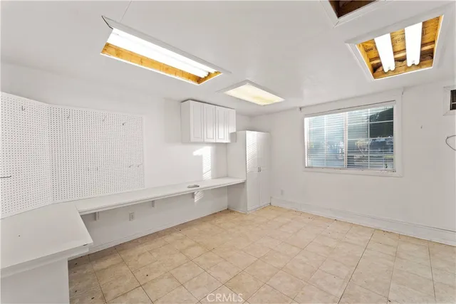 a bathroom with a tub and shower