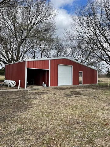 a house with trees in front of it