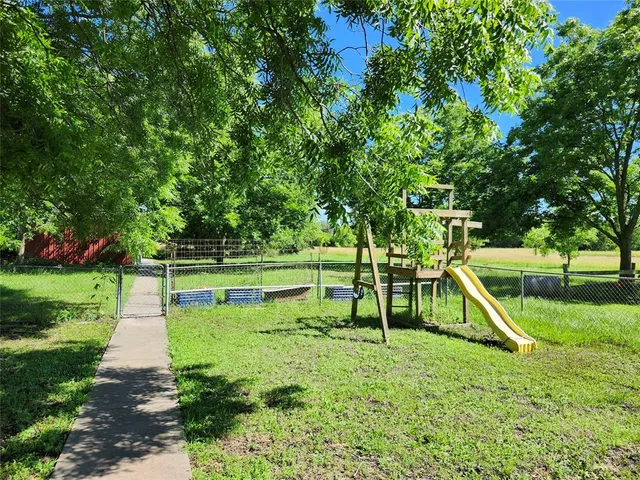 a view of a park with slide
