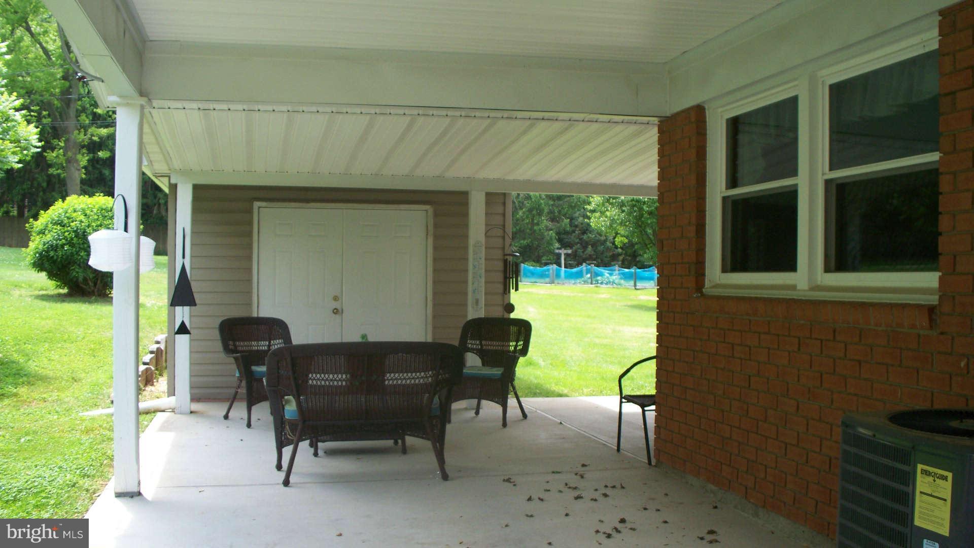 8 Colonial Road Bel Air, MD 21014 - Photo 5 of 30 View of Carport to Storage Room