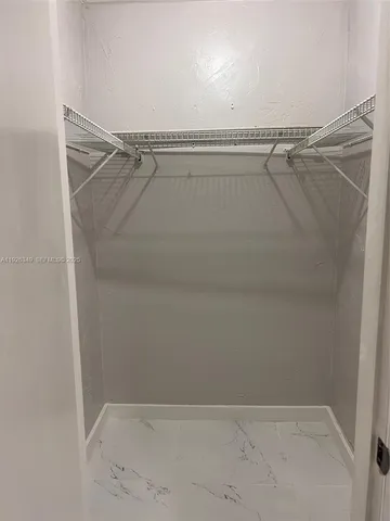 a view of a swimming pool with an outdoor seating and house