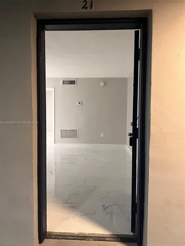 a view of kitchen and living room