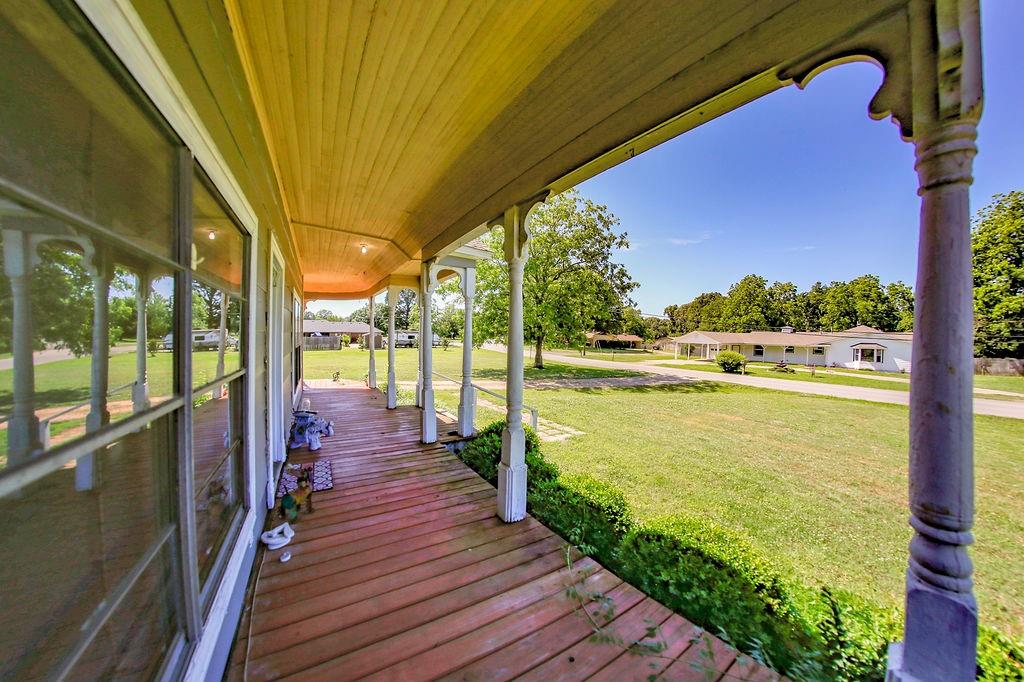 6730 Pine Mill Road Reno, TX 75462 - Photo 2 of 21 Porch with a lawn