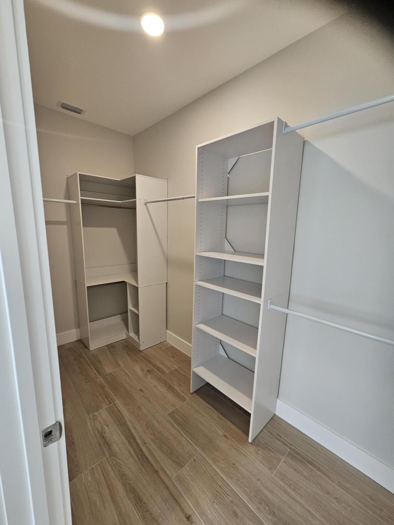 3838 Southeast Grant Street Stuart, FL 34997 - Photo 24 of 39 a view of an empty walk in closet