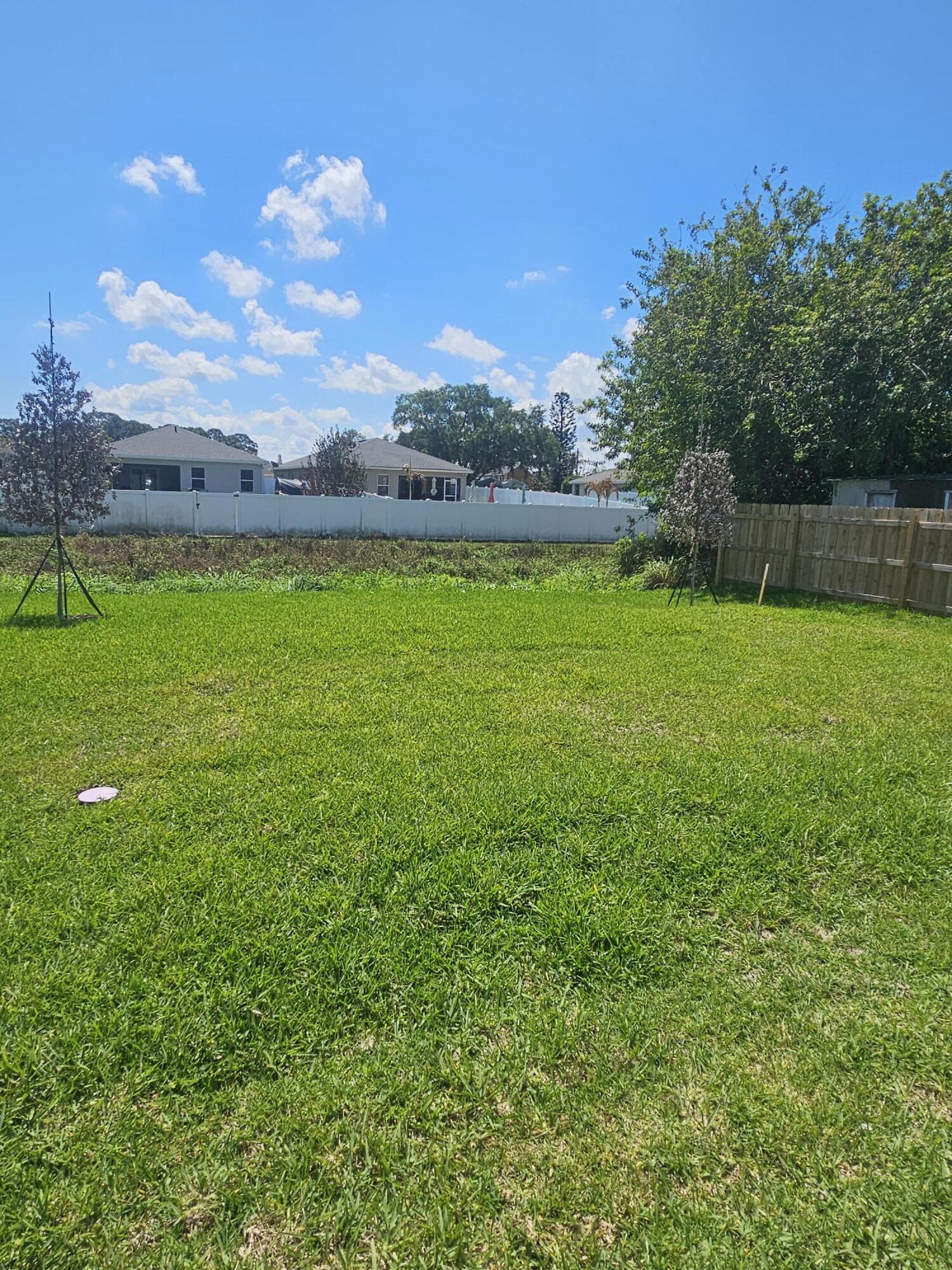 3838 Southeast Grant Street Stuart, FL 34997 - Photo 4 of 39 a view of a outdoor space and deck