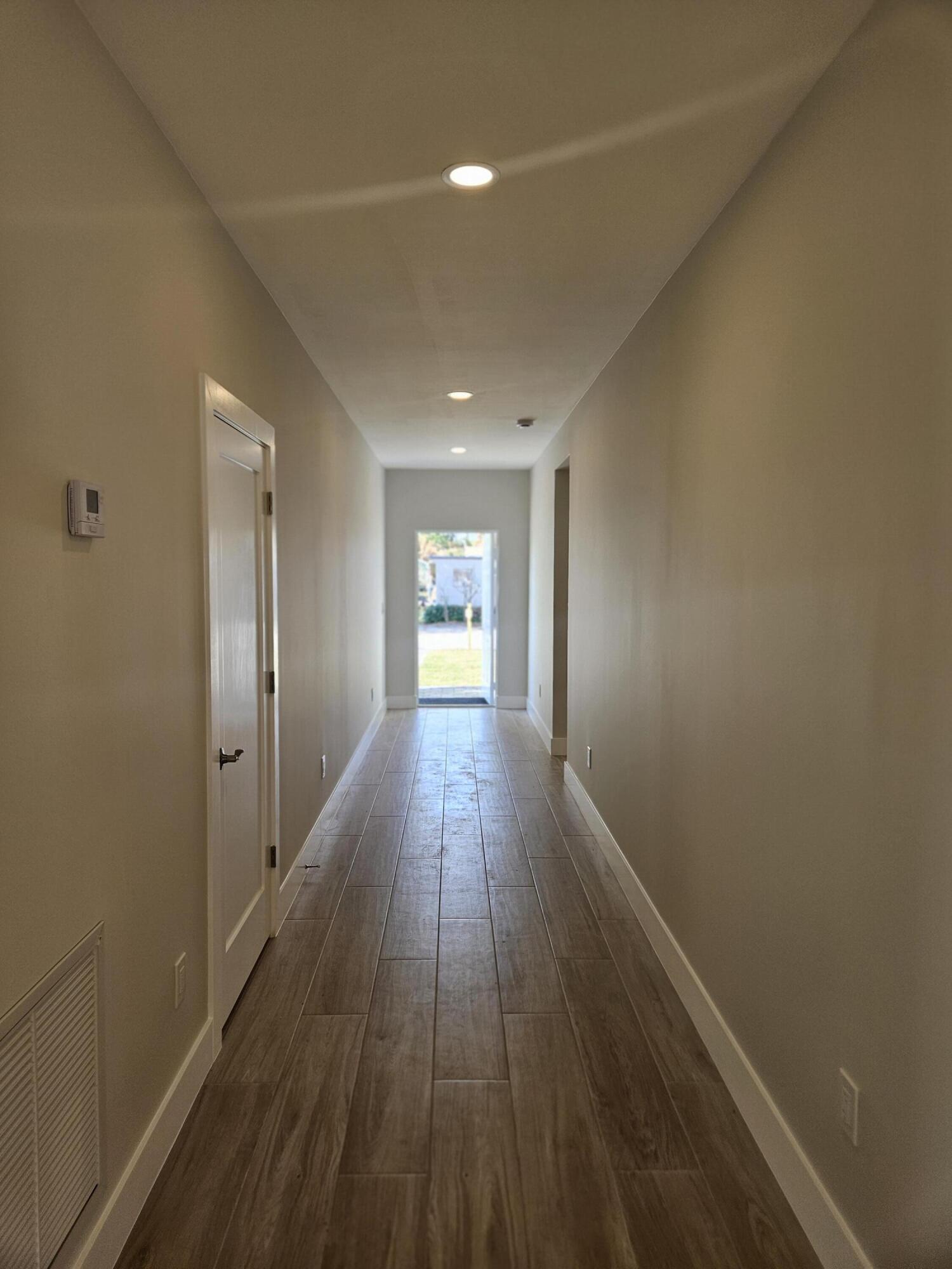 3838 Southeast Grant Street Stuart, FL 34997 - Photo 9 of 39 a view of gallery with wooden floor