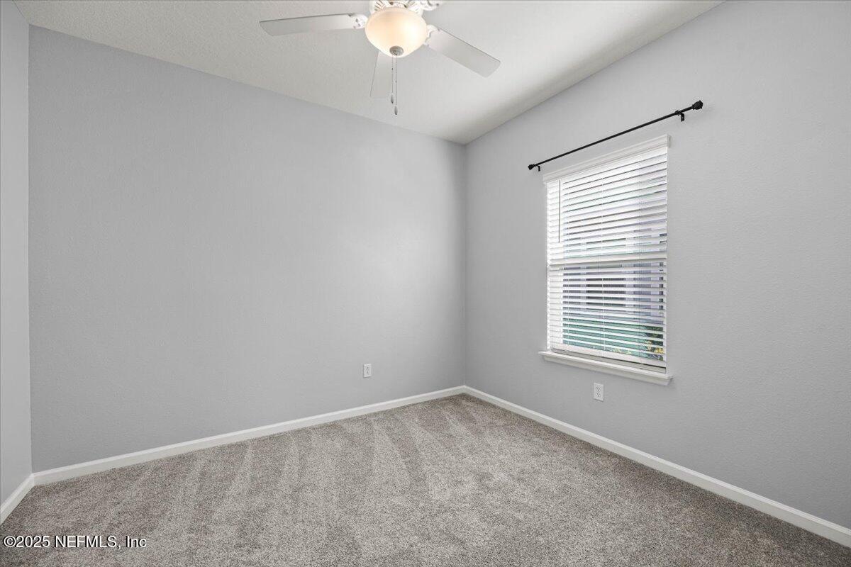 1728 Amberly Drive Middleburg, FL 32068 - Photo 22 of 32 an empty room with a window