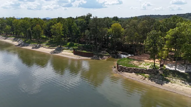 a view of an ocean and yard