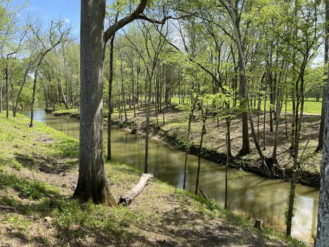 an aerial view of ocean with residential house and ocean view